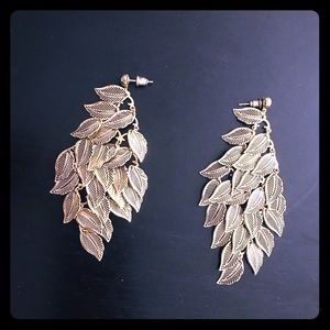 Gold feather earrings